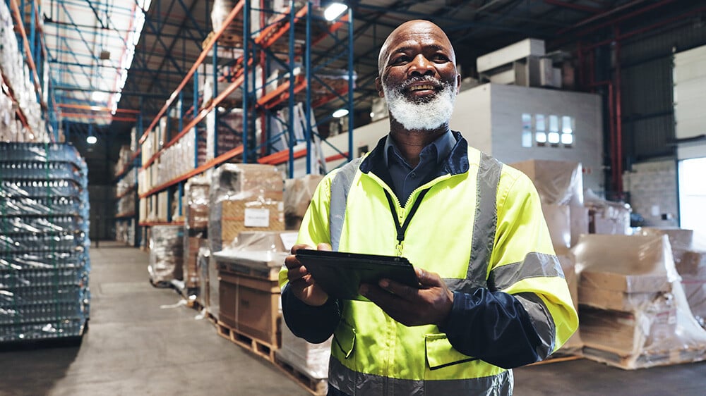 Smiling warehouse employee