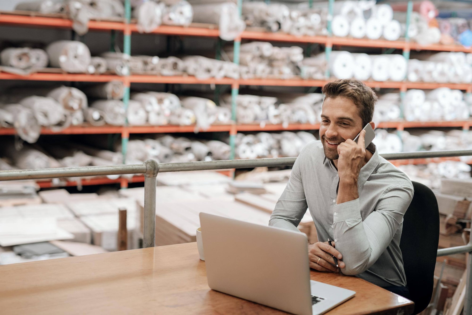 happy customer speaking with a metrology consultant on the phone